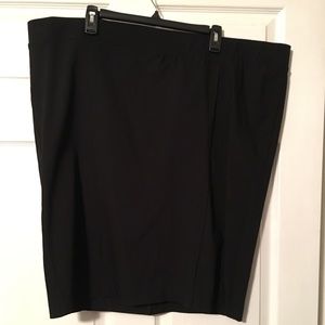 Sleek black pencil skirt with back slit / zipper